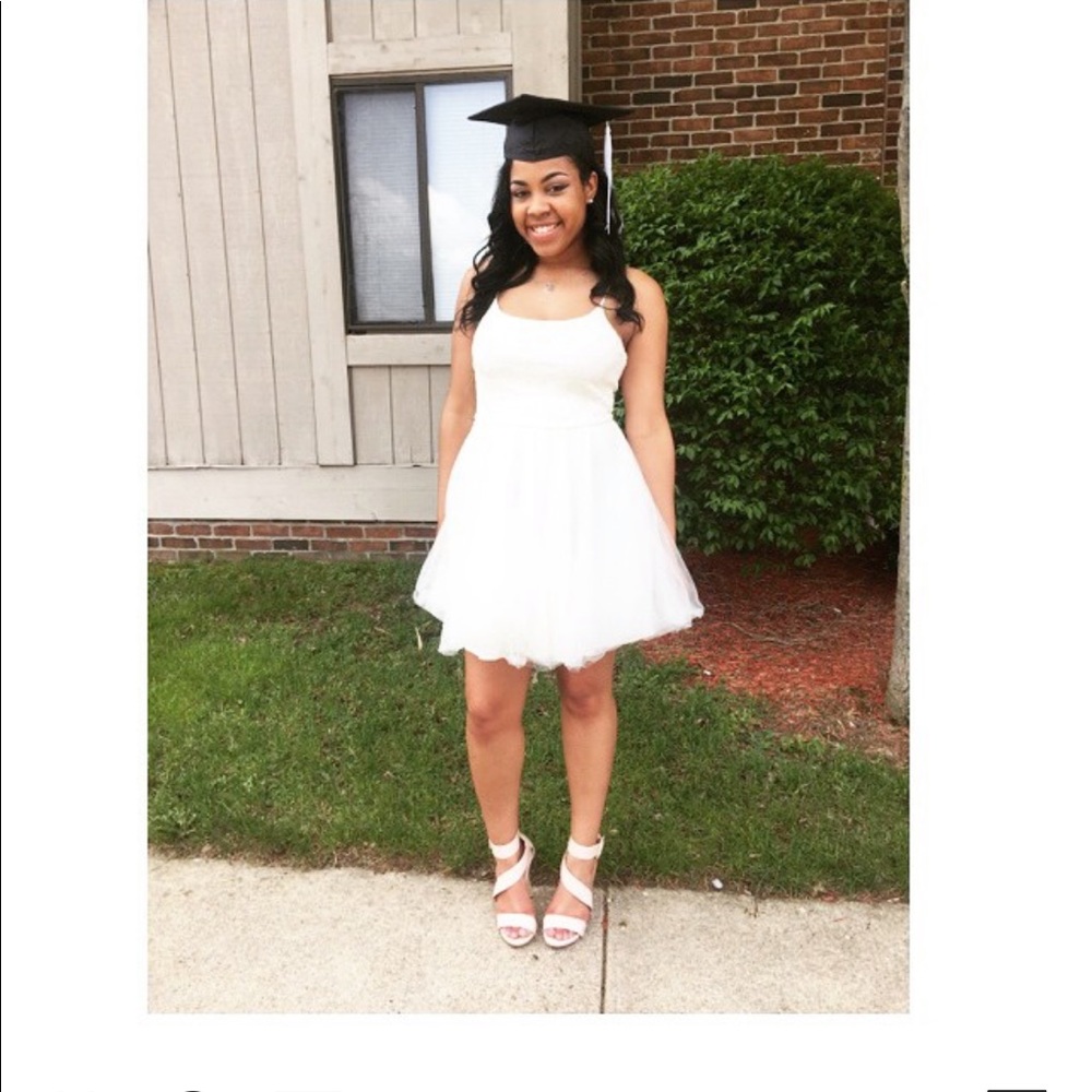 Ivory color/white dress with sparkles.